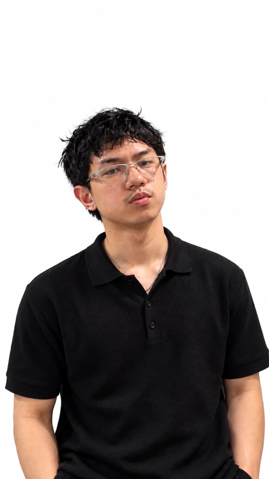 Carlo Angelo Felipe wearing glasses and a black polo shirt